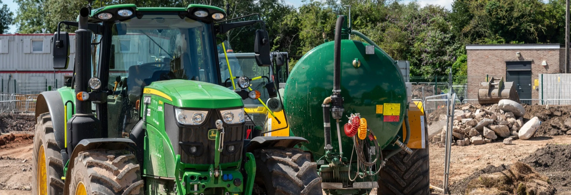 Water bowser mounted on a trailer to suppress dust on a construction site in UK